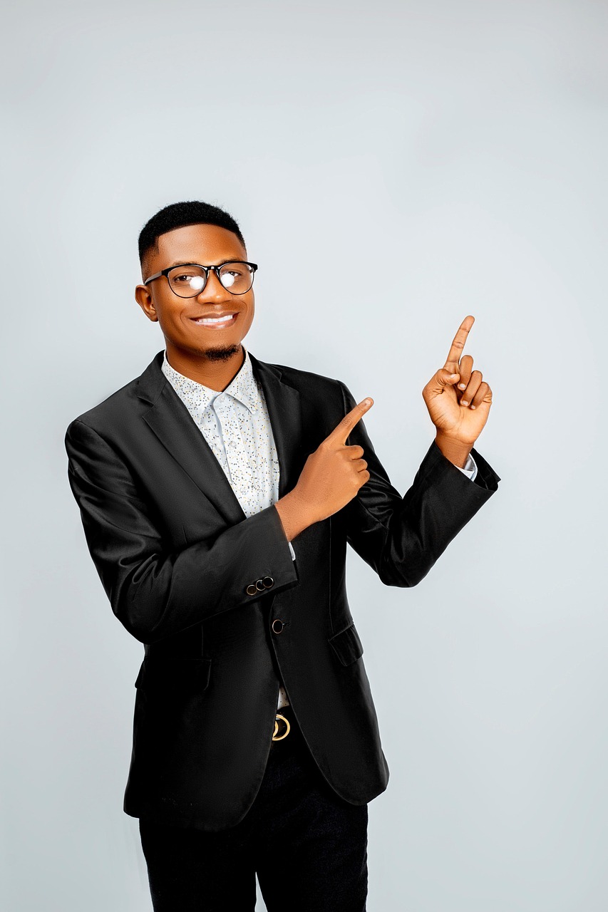 man, suit, formal, elegant, pointing, white background, advertising